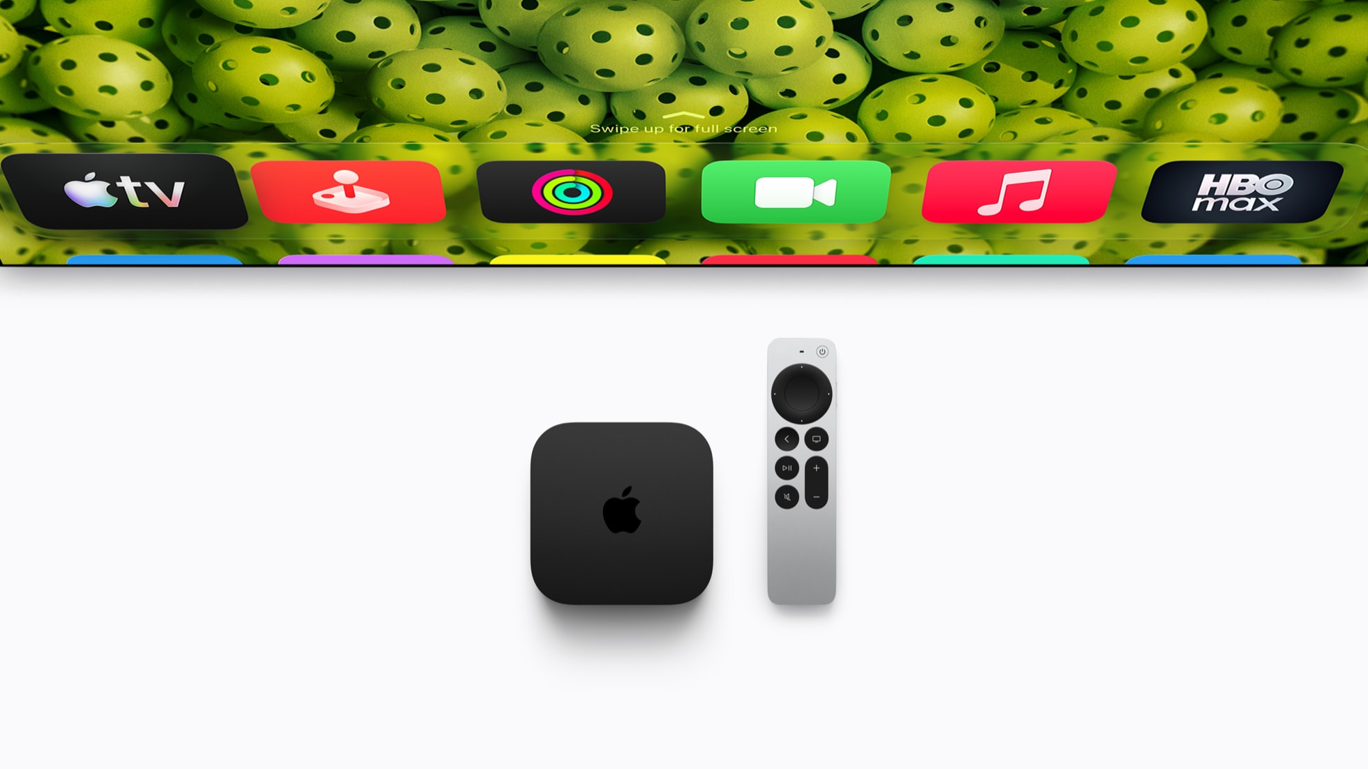 Apple TV 4K čtvrté generace a ovladač Siri Remote na tmavém pozadí