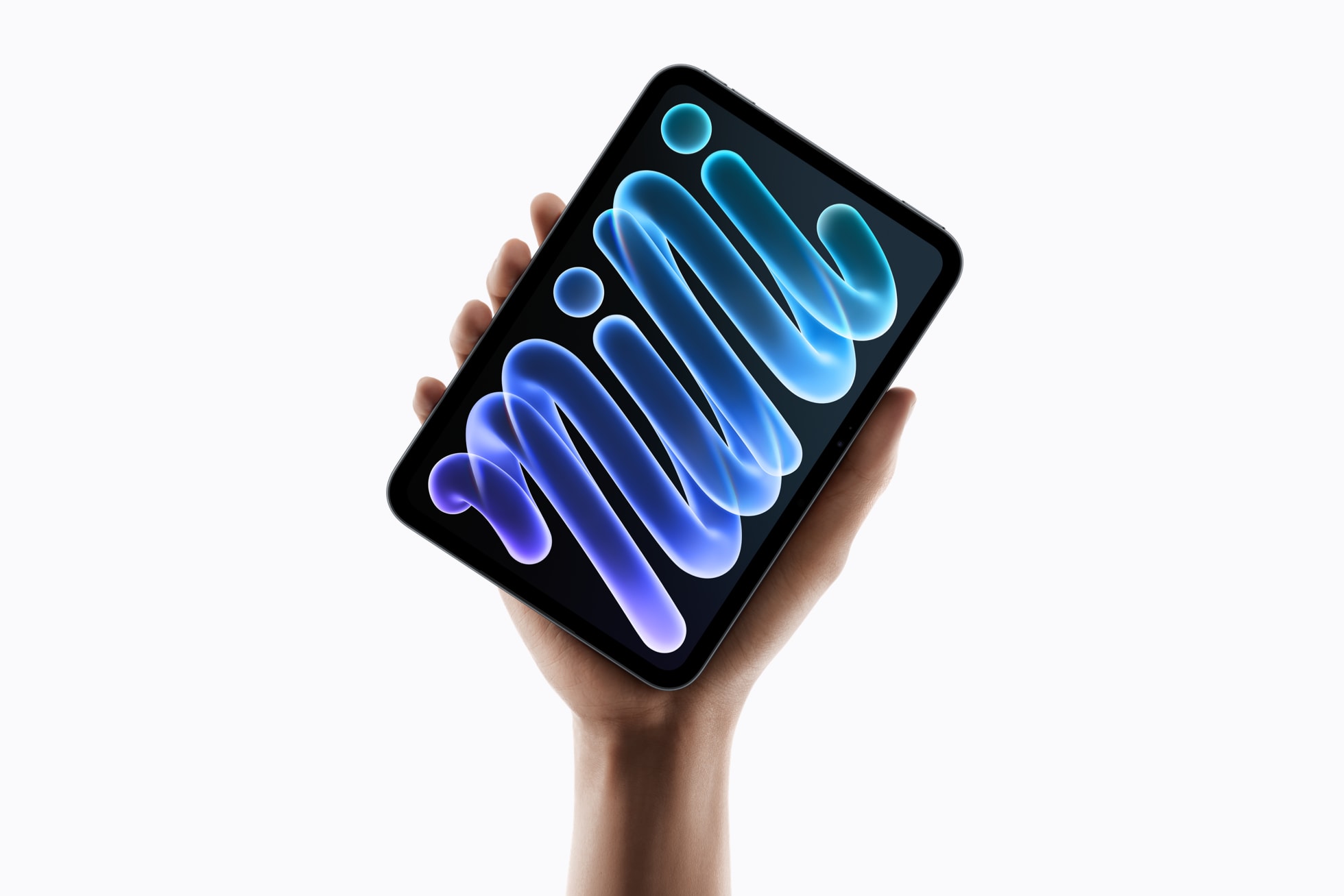 Nový iPad mini 2026 v temně inkoustové a hvězdně bílé barvě – oficiální fotografie Apple