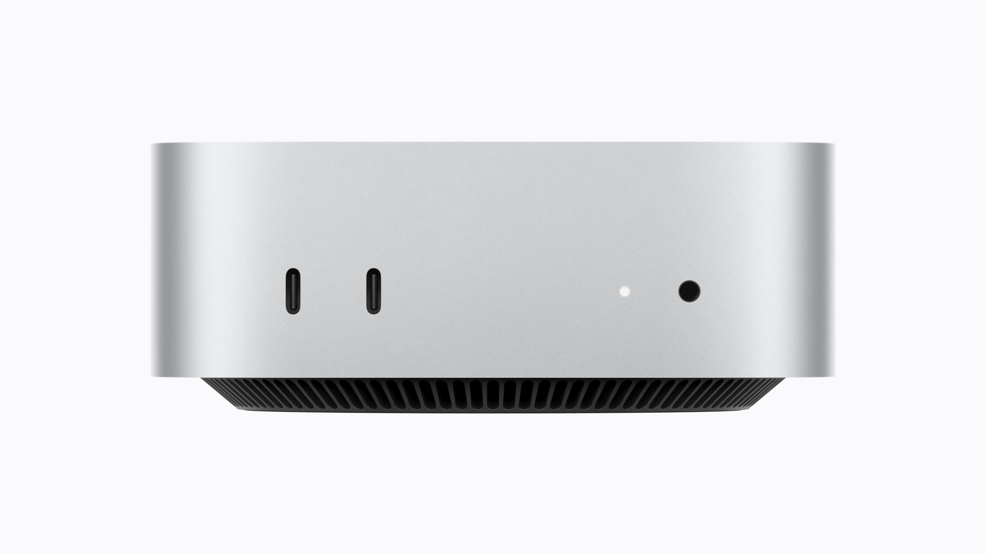 Přední porty Mac mini M6: dva USB-C a sluchátkový konektor